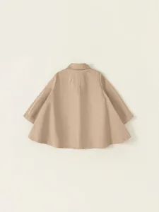 Girls beige hooded poncho coat in a loose A-line silhouette, back view display