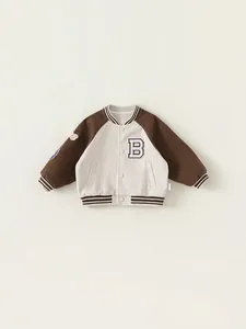 Kids vintage American style varsity jacket with contrast sleeves and letter B patch