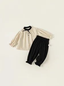 Girl's Korean-style beige puff sleeve top and black jogger pants two-piece outfit set