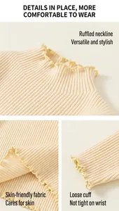 Detail van gebreide kindertrui met verfijnde ruches en elastische ribstof voor baby's