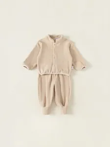 Ensemble sweat et pantalon en polaire crème pour bébé garçon avec fermeture boutonnée
