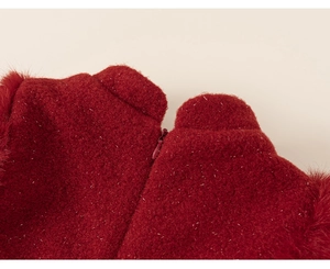 Close-up of deep red plush fabric with silver metallic threads and an invisible zipper detail