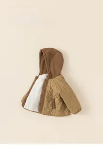 Detail view of thickened winter child jacket with sherpa lining and knitted hood
