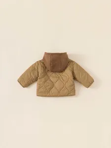 Padded hooded jacket for kids with mustard yellow quilted fabric and brown knit hood