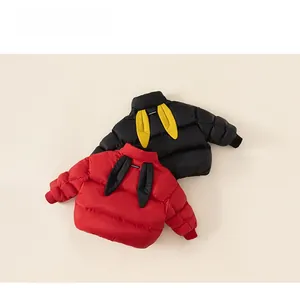 Detail view of kids puffer jacket showing the playful bunny ears design on the hood