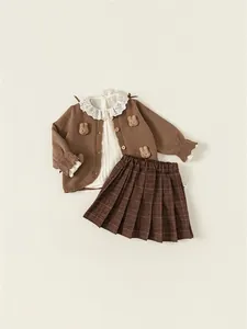 Girls' 3-piece autumn set with brown knit cardigan, lace blouse, and plaid pleated skirt