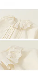 Detailed view of cream-colored shirt with ruffled Broderie Anglaise collar and pleats