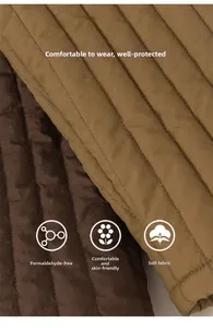 Detail of soft quilted fabric texture in ginger and dark brown for children pants