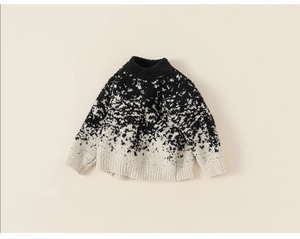 Detailed macro view of the soft knit sweater texture with monochromatic pattern