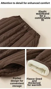 Detail of kids winter padded pants showing elastic waistband and warm fleece lining