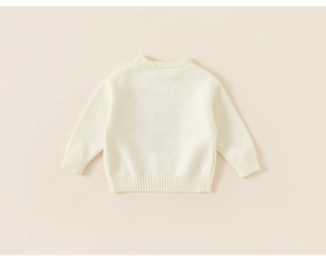 Back view of cream-colored knit sweater for toddlers with ribbed neck and sleeve details
