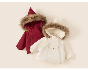 Close-up of children's thick hooded coats with faux fur trim and witch hat design