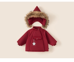 Detail of red winter hooded jacket with large front pocket and plush faux fur trim hood