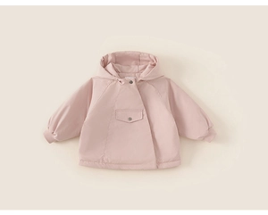 Detail view of pink hooded winter coat with snap buttons and large front pocket for kids