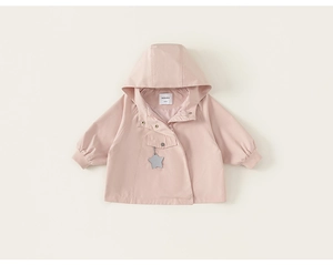 Detailed view of pink hooded winter coat with star pendant and soft ribbed cuffs