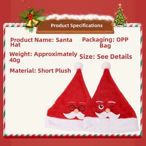 Detail of plush Christmas hat with white fur trim and embroidered Santa face features