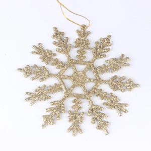 Golden glitter snowflake ornament for Christmas tree decoration with hanging string