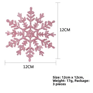 Dettaglio di fiocchi di neve rosa glitterati da 12cm per Natale, confezione da 3 pezzi