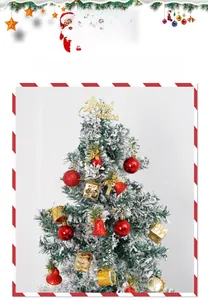 Detailed close-up of a snow-flocked Christmas tree with red balls and gold bells