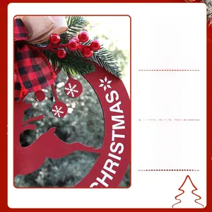 Close-up of red wooden Christmas door sign with reindeer cutout and bow details