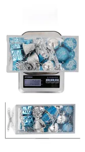 Detailed view of blue and silver Christmas tree ornaments box weighing 100g and 19.5cm long