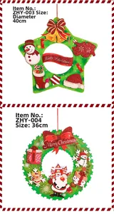 Detail of 3D paper Christmas wreaths with Santa and reindeer motifs in glittery green finish