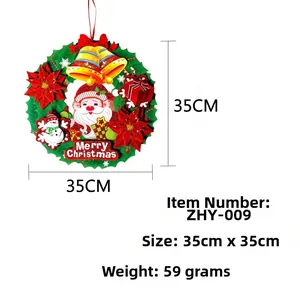 Detailed view of a 35cm 3D Christmas wreath with Santa and snowman on white background