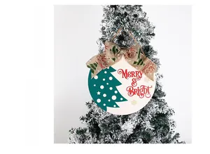 Detail view of round wooden Christmas sign with Merry Bright text and a burlap bow decoration