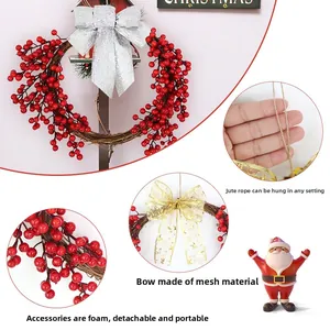 Detail of Christmas berry wreath with gold mesh bow and rustic hemp hanging rope
