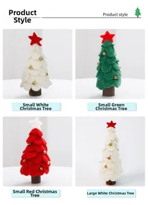 Detail of wool felt mini Christmas trees with wooden bases and gold bell decorations