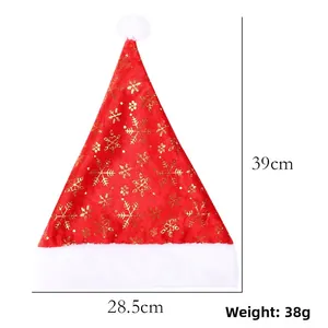 Detailed view of red velvet Santa hat with gold snowflakes, 39cm height and 28.5cm width