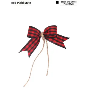 Detail of red and black plaid decorative bow with rustic burlap twine tie-knot
