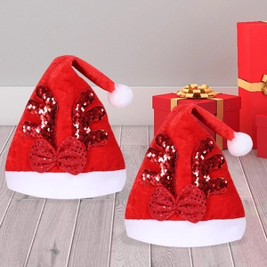 Set di due cappelli natalizi in velluto rosso con corna di paillettes su legno