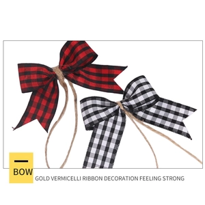 Detail of red and white buffalo plaid bows with rustic jute twine for Christmas decor