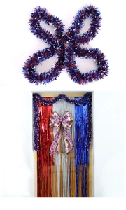 Detail of red white and blue foil tinsel garland with stars for Independence Day decor