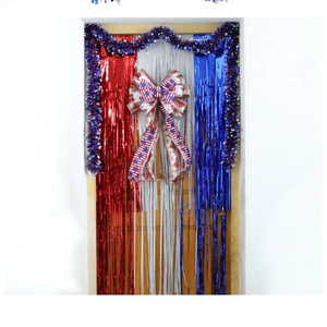 Independence Day decoration kit with red white blue foil curtains and star bow