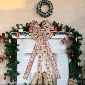 Large double-layered Christmas tree topper bow with festive red berries and pine trees