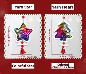 Close-up of glitter star and Christmas tree hanging ornaments with bells and wooden beads