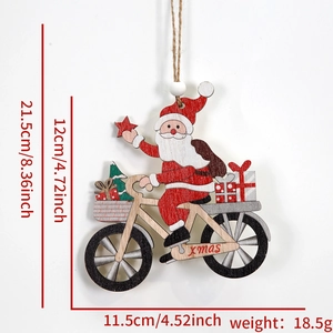 Detail of wooden Christmas ornament featuring Santa riding a bike with gifts and Xmas text