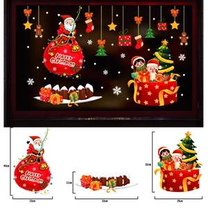 Detailed dimensions of Christmas static window stickers with Santa and snowman motifs