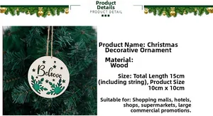 Detail of wooden Christmas ornament with Believe text and snowflake cutout 10cm