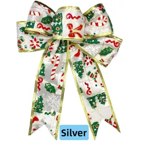 Silver Christmas ribbon bow with festive holiday patterns and gold wire edge details