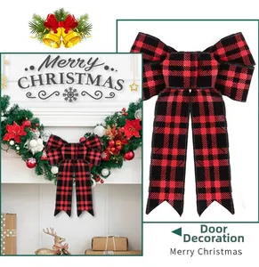 Red and black buffalo plaid Christmas bow displayed as festive home mantel decoration