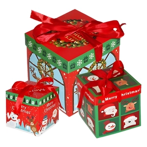 Three-piece Christmas gift box set with red and green festive patterns and ribbon bows