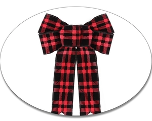 Detail of red and black buffalo plaid Christmas bow with fishtail ribbon ends