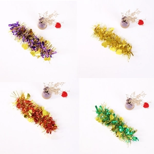 Sparkly heart tinsel slap bracelet in gold, red, purple, and green for party cheering