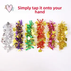Detail of colorful slap bracelets with shiny heart sequins and tinsel fringe