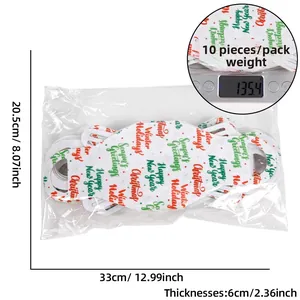 Détail du lot de sacs de Noël en feutre avec dimensions 33x20,5x6cm et poids de 135,4g