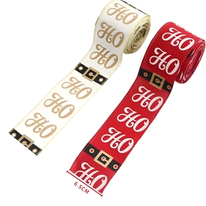 6.5cm Christmas ribbon rolls featuring HO HO HO festive print and Santa buckle patterns