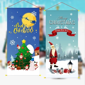 Detail of Christmas hanging flags featuring Santa Claus, snowman and starry night theme